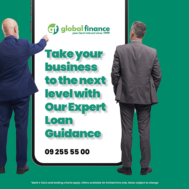 What steps do I take to approach a bank for a business loan?